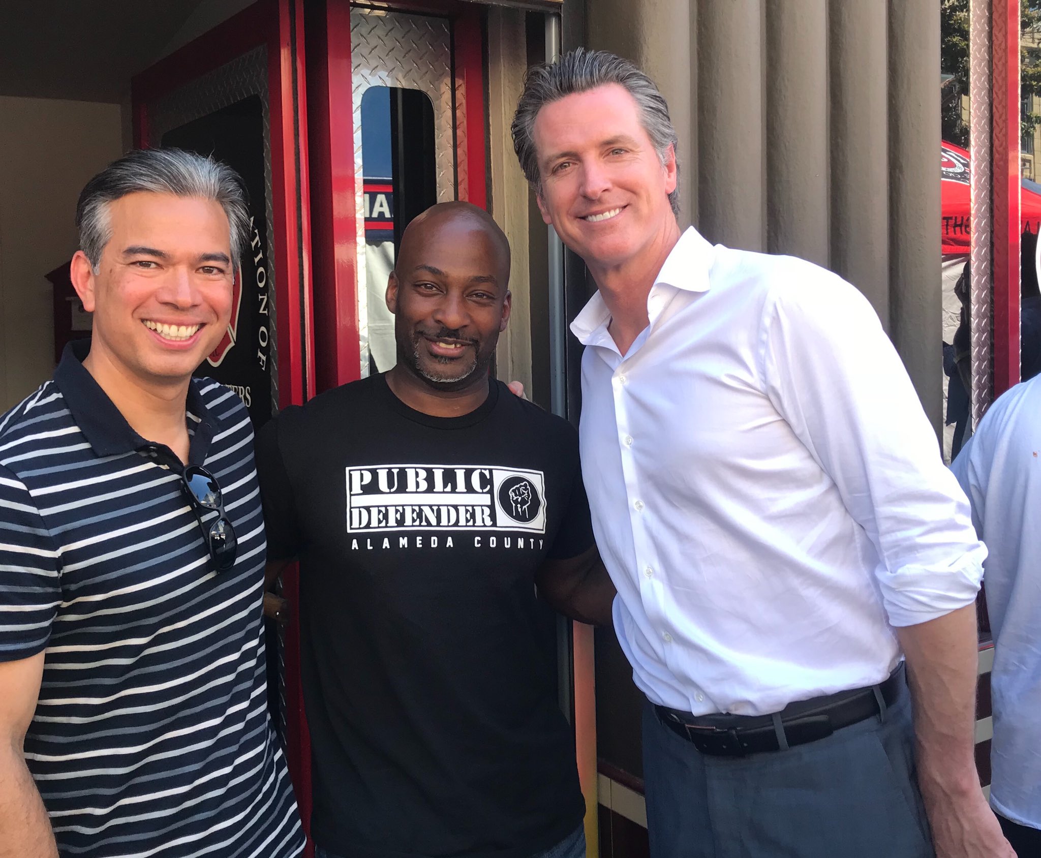 Brendon Woods with Attorney General Rob Bonta and Governor Gavin Newsom